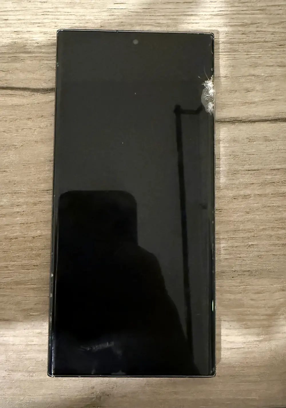 Actual damaged display from a Samsung Galaxy S23 Ultra